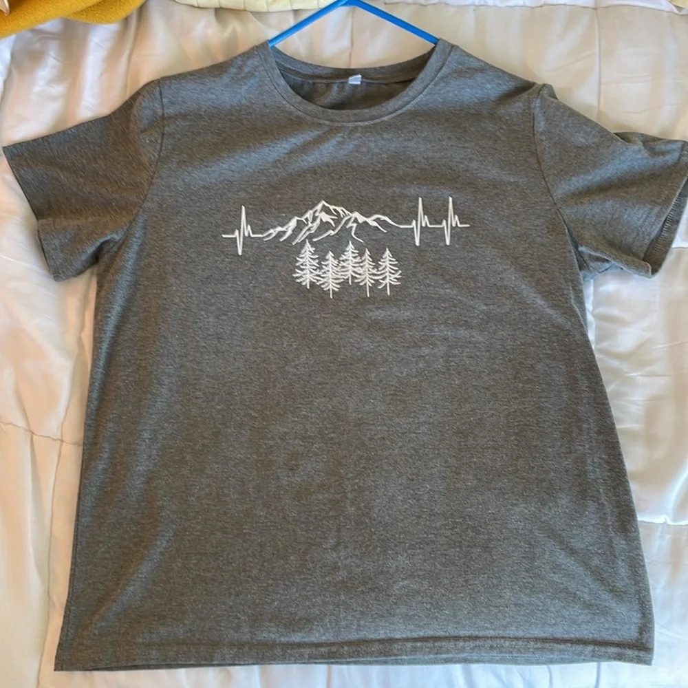 Gray women’s tshirt. Mountains. Pine trees. Life line. Heartbeat.  Runs small.